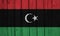 Libya Flag Over Wood Planks
