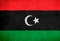 Libya flag painted on brick wall. National country flag background photo