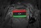 Libya flag on soldiers arm. Libyan army collage