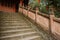 Lichen-covered steps with stone balustrade before ancient Chines