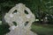 Lichen covered stone Celtic cross