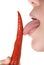 Licking chili pepper