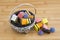 Licorice Allsorts in a Bowl on Wood
