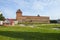 Lida castle old fortress orange color, located in the city of Lida, Belarus