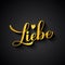 Liebe gold calligraphy hand lettering on black background. Love inscription in German. Valentines day typography poster