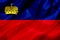 Liechtenstein country flag on silk or silky waving texture