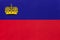 Liechtenstein principality national fabric flag textile background. Symbol of international world european country