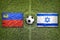 Liechtenstein vs. Israel flags on soccer field