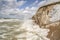 Liepaja, Latvia- July 7, 2023: Ruins of bunkers on the beach of the Baltic sea, part of an old fort in the former Soviet
