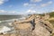 Liepaja, Latvia- July 7, 2023: Ruins of bunkers on the beach of the Baltic sea, part of an old fort in the former Soviet