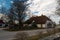 LIEPUPE, LATVIA - APRIL 13, 2019: Old medieval house Jasmini in beautiful sunny Spring weather with blue sky and clouds