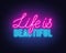 Life is Beautiful neon lettering on brick wall background.