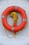 Life buoy hanging on wall stock photo