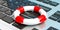 Life buoy on a laptop. 3d illustration