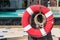 .Life buoy or lifesaver, hanging at swimming pool.Thailand