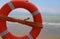 life-buoy by the sea with the rescue rope