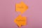 life choice  orange stickers in the form of index arrows with text Complicated and Simple on pink background