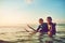 Life is fun when youre out surfing with a buddy. Shot of two young boys out surfing.