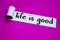 Life is Good text, Inspiration, Motivation and business concept on purple torn paper