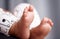 Life has only just begun. an unrecognisable babys adorable feet at home.