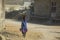 Life in India: Little Girl Carrying Bowl on Head