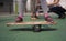 Life in a modern city - a girl rides a balance-board on an advanced playground