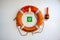 Life preservers on white wall. Life buoy on the deck of cruise ship.