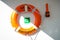 Life preservers on white wall. Life buoy on the deck of cruise ship.