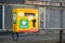 Life Saving Defibrillator (Heart Restarter) yellow rescue box in the streets of Scotland