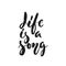 Life is a song - hand drawn lettering quote isolated on the white background. Fun brush ink vector illustration for
