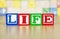 Life Spelled Out in Alphabet Building Blocks