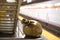 Life Underground. Bronze subway bag with dollars. New York City Subway`s 14th Street-Eighth Avenue station