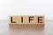 Life word on wooden cubes