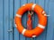 Lifebelt hanging on wooden shed