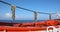 lifeboat with ropes in a cruise ship off the ocean