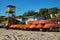 Lifeboats labeled Rescuer are overturned and stacked. Rescue tower and life buoys at the rescue station in Odessa Ukraine