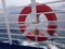 A lifebuoy against the sea photographed close-up