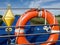 Lifebuoy on a boat sailing along the canal