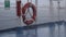 Lifebuoy on the ferry deck in the rain