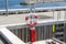 Lifebuoy hang on the pier. Concept of a safe holiday