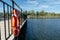 Lifebuoy hanging on a pier overlooking the river