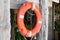 Lifebuoy or life preserver hanging on rescue booth