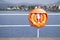Lifebuoy orange water safety ring at Helensburgh beach