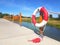 Lifebuoy in red and white color on a wood joist