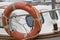 A lifebuoy or ring buoy preserver on the boat