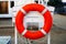 A lifebuoy, symbol of assistance, security, rescue, SOS on Beach