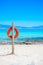 A lifebuoy, symbol of assistance, security, rescue, SOS on Golden Beach in Chrysi island, Crete, Greece