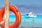 A lifebuoy, symbol of assistance, security, rescue, SOS on Golden Beach in Chrysi island, Crete, Greece