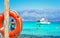 A lifebuoy, symbol of assistance, security, rescue, SOS on Golden Beach in Chrysi island, Crete, Greece