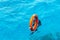 A lifebuoy is thrown into the water of a drowning person